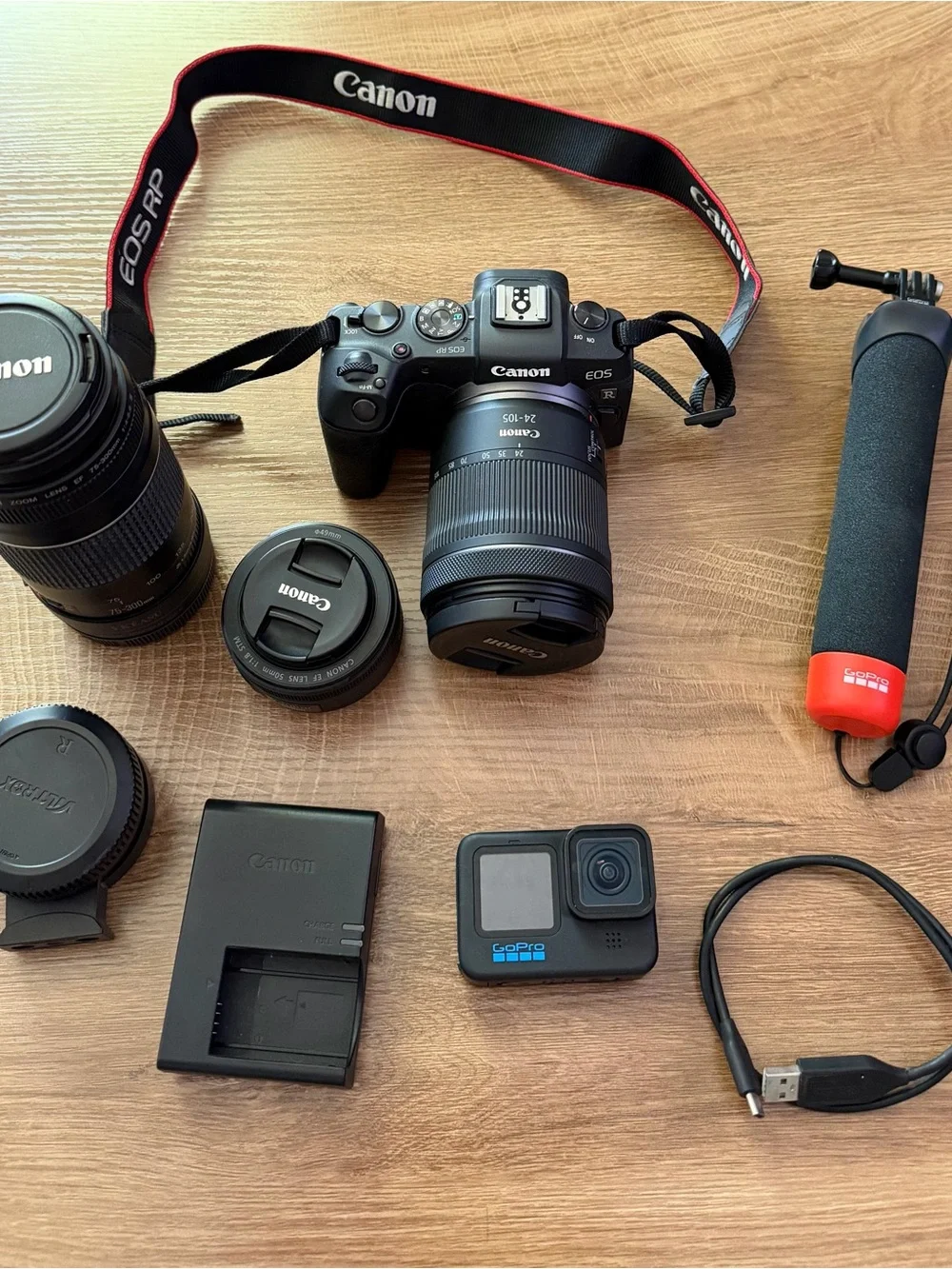 Canon RP comes with 24-105 , 75-300 , 50 mm lenses. Go Pro hero 10 black.